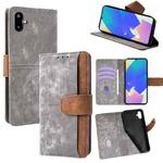 For Samsung Galaxy F06 5G Color Stitching Skin Feel Leather RFID Blocking Phone Case(Grey)