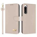 For Sony Xperia 5 IV Metal Bow Leather Phone Case with Hand Strap(Apricot)