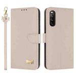 For Sony Xperia 10 V Metal Bow Leather Phone Case with Hand Strap(Apricot)
