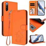 For Sony Xperia 10 V Embossed Heart Cat Leather Phone Case with Strap(Orange)