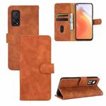 For Xiaomi Mi 10T Solid Color Skin Feel Magnetic Buckle Horizontal Flip Calf Texture PU Leather Case with Holder & Card Slots & Wallet(Brown)