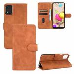 For LG K42 Solid Color Skin Feel Magnetic Buckle Horizontal Flip Calf Texture PU Leather Case with Holder & Card Slots & Wallet(Brown)