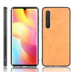 For Xiaomi Mi Note 10 Lite Shockproof Sewing Cow Pattern Skin PC + PU + TPU Case(Orange)