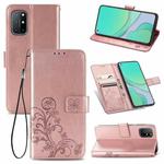 For OnePlus 8T Four-leaf Clasp Embossed Buckle Mobile Phone Protection Leather Case with Lanyard & Card Slot & Wallet & Bracket Function(Rose Gold)