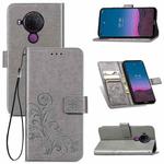 For Nokia 5.4 Four-leaf Clasp Embossed Buckle Mobile Phone Protection Leather Case with Lanyard & Card Slot & Wallet & Bracket Function(Gray)