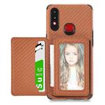 For Samsung Galaxy A10S Carbon Fiber Magnetic Card Bag TPU+PU Shockproof Back Cover Case with Holder & Card Slot & Photo Frame(Brown)