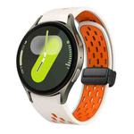 For Samsung Galaxy Watch 7 40 / 44mm Two Color Magnetic Folding Black Buckle Silicone Watch Band(Starlight Orange)