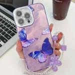 For iPhone 15 Pro Plating Texture Butterfly Wristband TPU Phone Case with Glitter Lens Film(Purple Butterflies HU4)