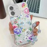 For iPhone 16 Electroplating Flowers Plants Texture Wristband TPU Phone Case(Peony FL14)