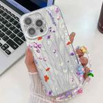 For iPhone 16 Pro Max Electroplating Flower Texture Wristband TPU Phone Case(Purple Wildflowers SH1)