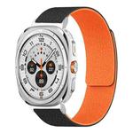 For Samsung Galaxy Watch Ultra 47mm / Ultra 2025 Lychee Texture Soft Magnetic Silicone Watch Band(Black Orange)