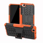 Tire Texture TPU+PC Shockproof Protective Case for Xiaomi Redmi Go, with Holder (Orange)