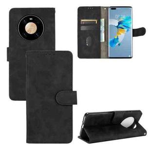 For Huawei Mate 40 Pro Solid Color Skin Feel Magnetic Buckle Horizontal Flip Calf Texture PU Leather Case with Holder & Card Slots & Wallet(Black)