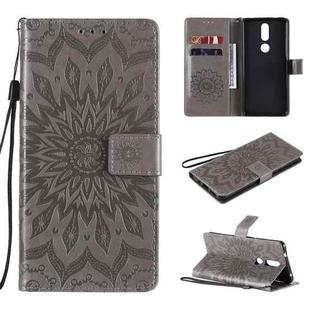 For Nokia 2.4 Sun Embossing Pattern Horizontal Flip Leather Case with Card Slot & Holder & Wallet & Lanyard(Grey)