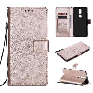 For Nokia 2.4 Sun Embossing Pattern Horizontal Flip Leather Case with Card Slot & Holder & Wallet & Lanyard(Rose Gold)
