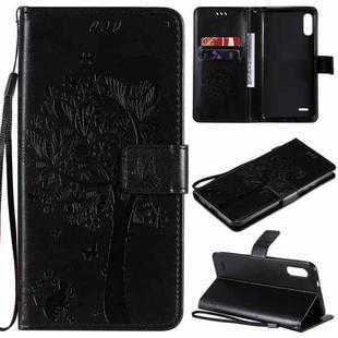 For LG K22 / K22 Plus Tree & Cat Pattern Pressed Printing Horizontal Flip PU Leather Case with Holder & Card Slots & Wallet & Lanyard(Black)