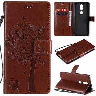 For Nokia 2.4 Tree & Cat Pattern Pressed Printing Horizontal Flip PU Leather Case with Holder & Card Slots & Wallet & Lanyard(Coffee)