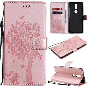 For Nokia 2.4 Tree & Cat Pattern Pressed Printing Horizontal Flip PU Leather Case with Holder & Card Slots & Wallet & Lanyard(Rose Gold)