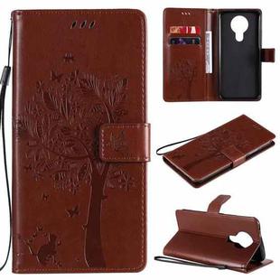 For Nokia 3.4 Tree & Cat Pattern Pressed Printing Horizontal Flip PU Leather Case with Holder & Card Slots & Wallet & Lanyard(Coffee)