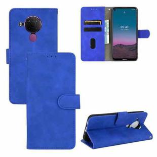 For Nokia 5.4 Solid Color Skin Feel Magnetic Buckle Horizontal Flip Calf Texture PU Leather Case with Holder & Card Slots & Wallet(Blue)
