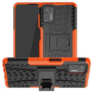 For Motorola Moto G Stylus (2021) Tire Texture Shockproof TPU+PC Protective Case with Holder(Orange)