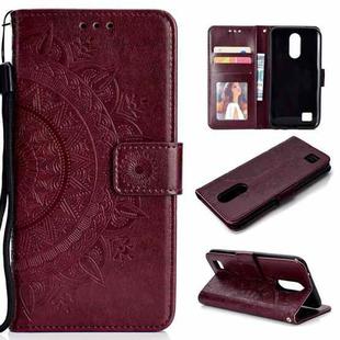 For LG K10 (2017) (EU / US Version)  Totem Flower Embossed Horizontal Flip TPU + PU Leather Case with Holder & Card Slots & Wallet(Brown)