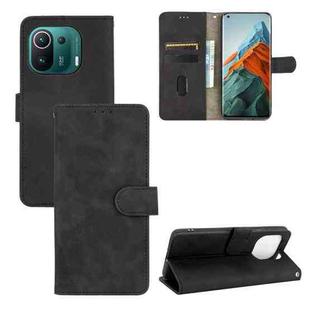 For Xiaomi Mi 11 Pro Solid Color Skin Feel Magnetic Buckle Horizontal Flip Calf Texture PU Leather Case with Holder & Card Slots & Wallet(Black)