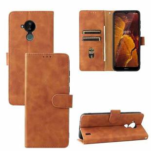For Nokia C30 Solid Color Skin Feel Magnetic Buckle Horizontal Flip Calf Texture PU Leather Case with Holder & Card Slots & Wallet(Brown)