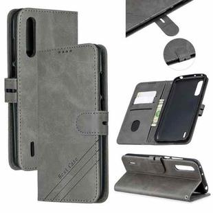 For Xiaomi Mi CC9e Stitching Style 2-Color Cow Texture Horizontal Flip PU Leather Case with Holder & Card Slot & Lanyard(Gray)
