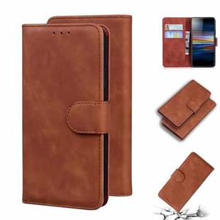 For Sony Xperia L3 Skin Feel Pure Color Flip Leather Phone Case(Brown)