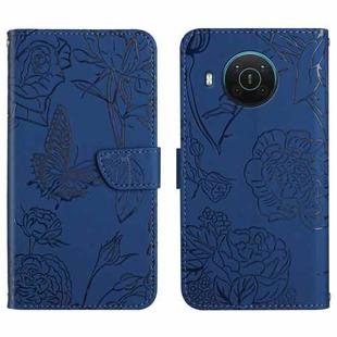For Nokia X20 Skin Feel Butterfly Peony Embossed Leather Phone Case(Blue)