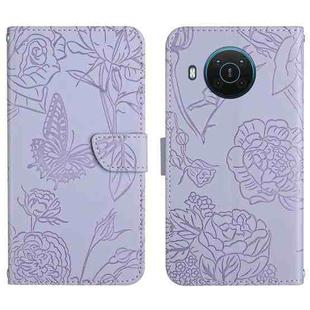 For Nokia X20 Skin Feel Butterfly Peony Embossed Leather Phone Case(Purple)