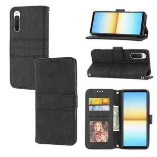 For Sony Xperia 10 IV Embossed Striped Magnetic Buckle Horizontal Flip Phone Leather Case(Black)