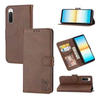 For Sony Xperia 10 IV Embossed Happy Cat Pattern Leather Phone Case(Brown)
