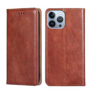 For iPhone 14 Pro Max Gloss Oil Solid Color Magnetic Leather Phone Case (Brown)