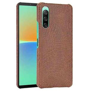 For Sony Xperia 10 IV Shockproof Crocodile Texture PC + PU Case(Brown)