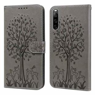 For Sony Xperia 10 IV Tree & Deer Pattern Pressed Flip Leather Phone Case(Grey)