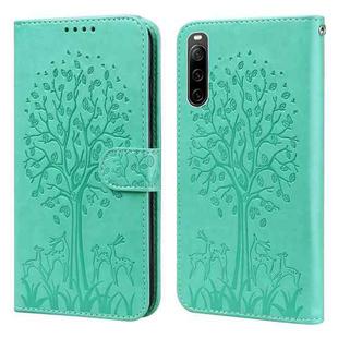 For Sony Xperia 10 IV Tree & Deer Pattern Pressed Flip Leather Phone Case(Green)