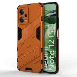 For Xiaomi Redmi Note 12 China / Note 12 5G India Punk Armor 2 in 1 PC + TPU Phone Case with Invisible Holder(Orange)