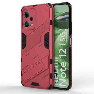 For Xiaomi Redmi Note 12 China / Note 12 5G India Punk Armor 2 in 1 PC + TPU Phone Case with Invisible Holder(Light Red)