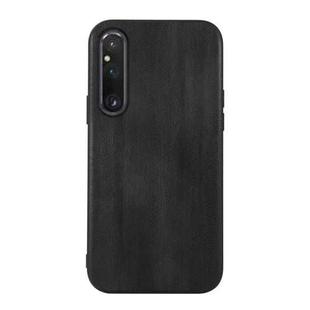 For Sony Xperia 1 V Yellow Cow Texture PU Phone Case(Black)