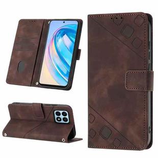 For Honor X8a 4G Global Skin-feel Embossed Leather Phone Case(Brown)