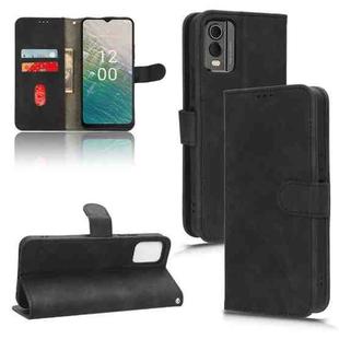For Nokia C32 Skin Feel Magnetic Flip Leather Phone Case(Black)