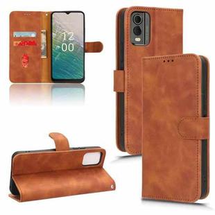 For Nokia C32 Skin Feel Magnetic Flip Leather Phone Case(Brown)