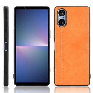 For Sony Xperia 5 V Sewing Cow Pattern Skin PC + PU + TPU Phone Case(Orange)