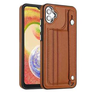 For Samsung Galaxy A04E / F04 / M04 Shockproof Leather Phone Case with Wrist Strap(Brown)