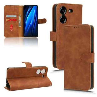 For Tecno Pova 5 Skin Feel Magnetic Flip Leather Phone Case(Brown)