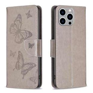 For iPhone 15 Pro Max Embossing Two Butterflies Pattern Leather Phone Case(Grey)