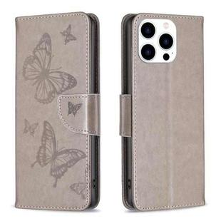 For iPhone 16 Pro Embossing Two Butterflies Pattern Leather Phone Case(Grey)