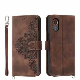 For Samsung Galaxy Xcover 7 Skin-feel Flowers Embossed Wallet Leather Phone Case(Brown)